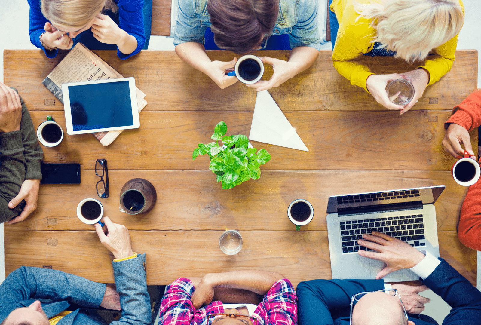 Corporate image of people sitting at the table